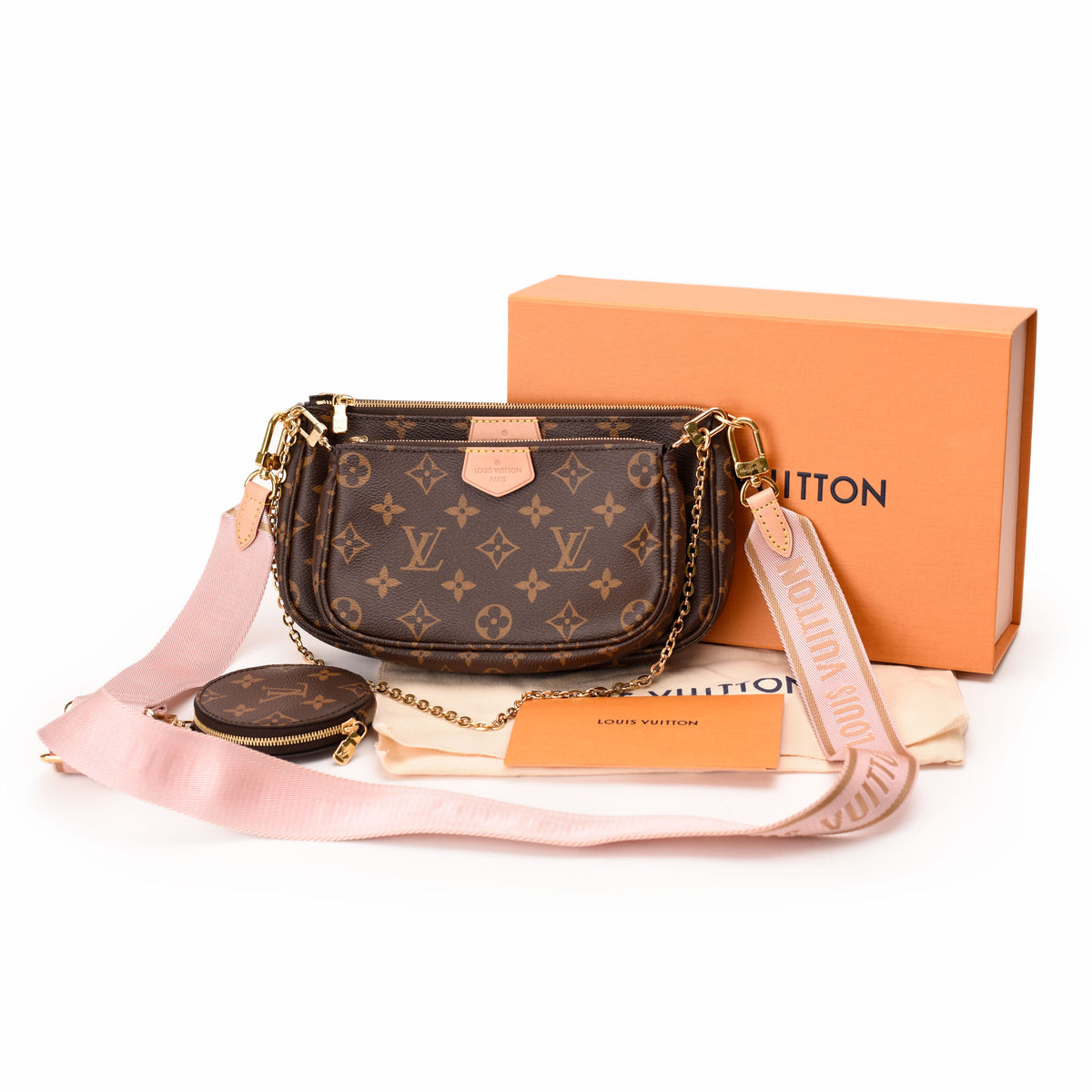Louis Vuitton Monogram canvas crossbody bag with pink strap and coin purse. curated Pre-loved Luxury by Myluxe in Helsinki.