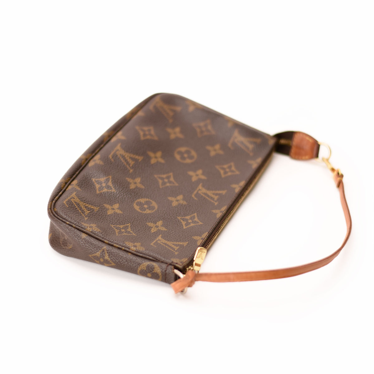 Louis Vuitton monogram brown canvas clutch with tan leather strap. curated Pre-loved Luxury by Myluxe in Helsinki.