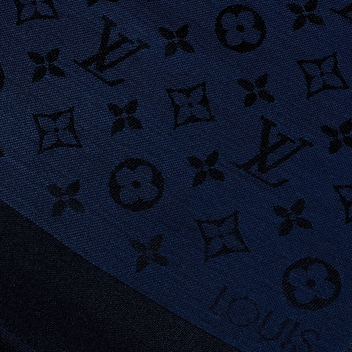 Navy blue monogram canvas with black designer patterns, curated Pre-loved Luxury by Myluxe in Helsinki.