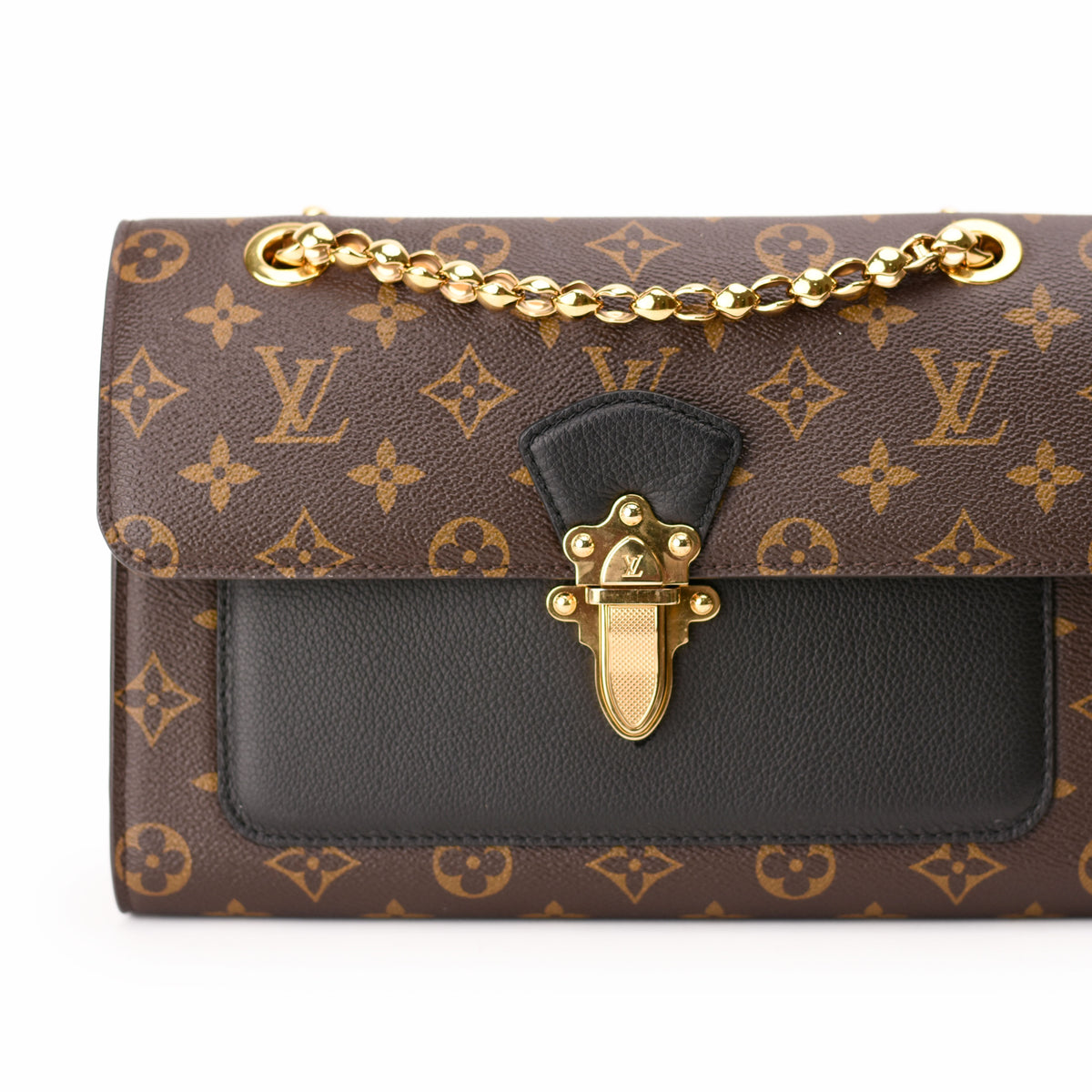 Brown Louis Vuitton monogram canvas shoulder bag with black leather and gold-tone clasp. curated Pre-loved Luxury by Myluxe in Helsinki.