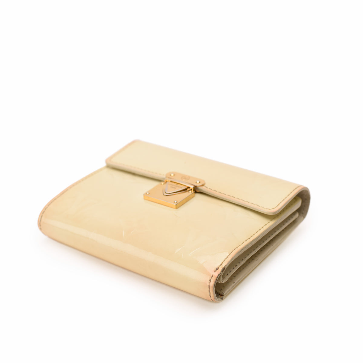 Cream patent leather folding wallet with gold-tone metal clasp, curated Pre-loved Luxury by Myluxe in Helsinki.