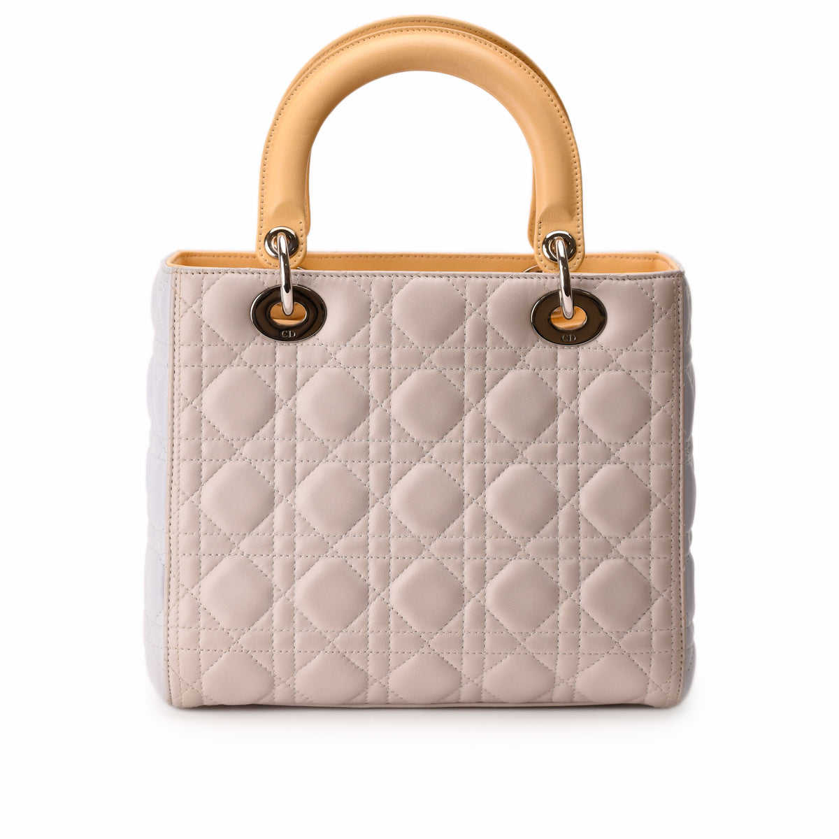 Dior Lady Dior quilted beige leather handbag with tan handle. curated Pre-loved Luxury by Myluxe in Helsinki.