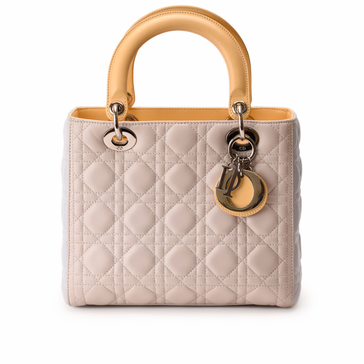 Beige quilted leather Dior Lady Dior handbag with gold-tone hardware, curated Pre-loved Luxury by Myluxe in Helsinki.