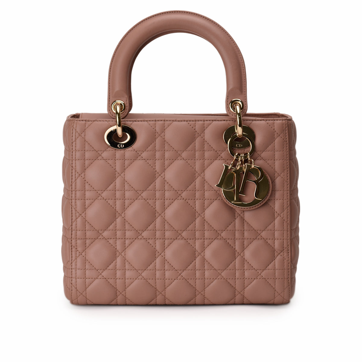 Dusty rose quilted leather Dior Lady Dior handbag with gold-tone charms, curated Pre-loved Luxury by Myluxe in Helsinki.