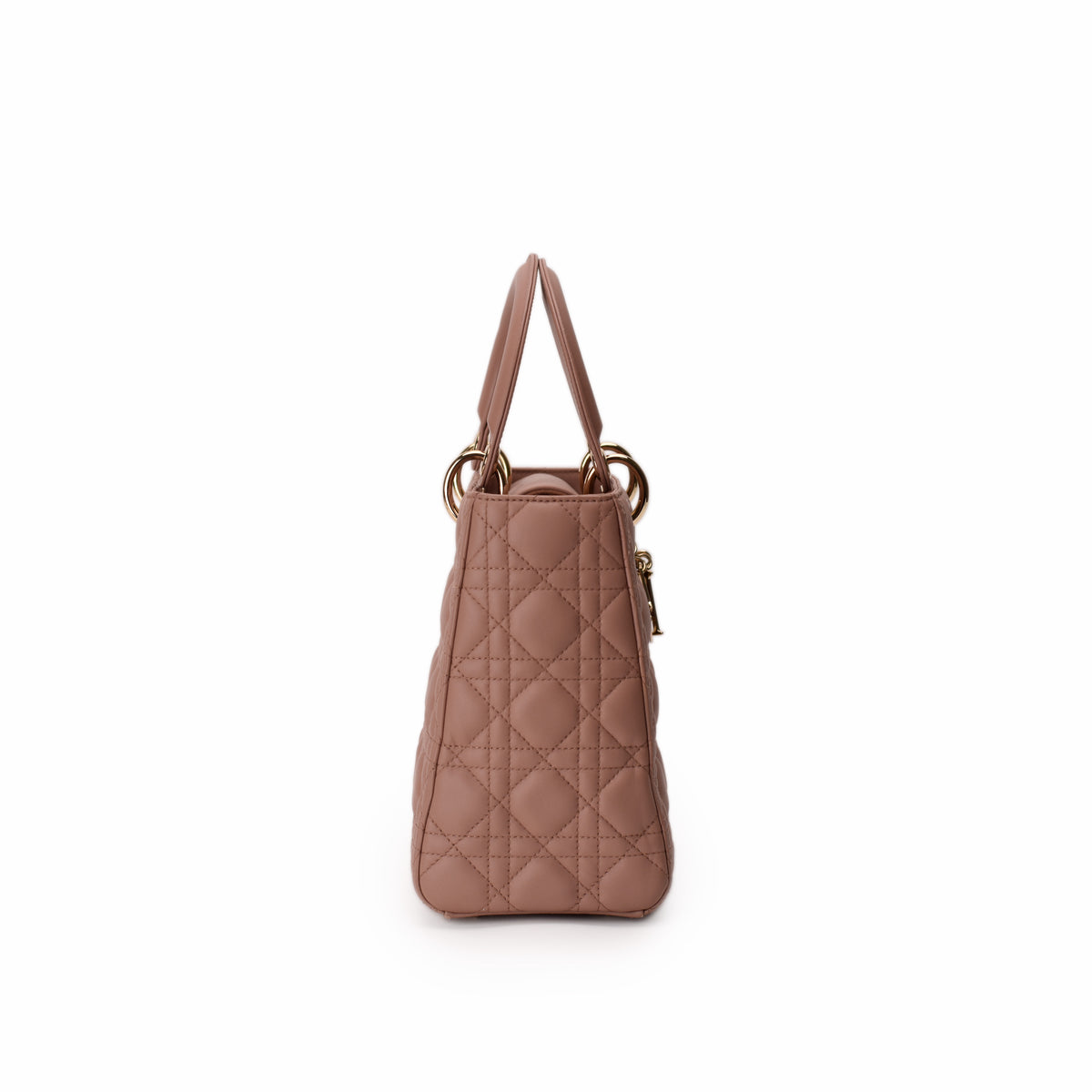 Dusty rose quilted leather handbag with gold-tone hardware, curated Pre-loved Luxury by Myluxe in Helsinki.