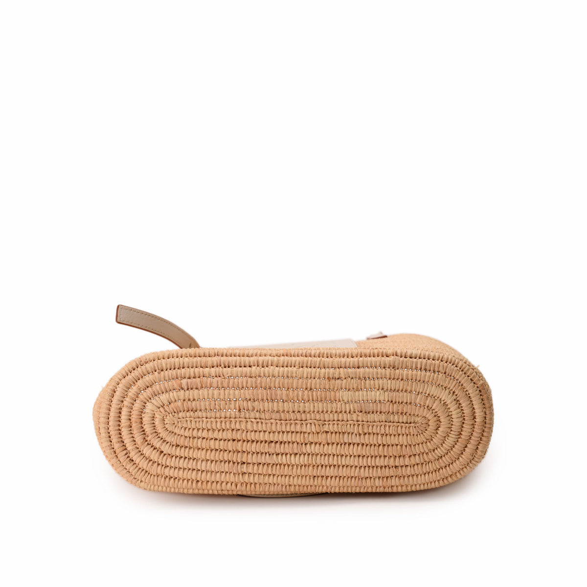 Bottom view of a beige woven straw handbag, curated Pre-loved Luxury by Myluxe in Helsinki.