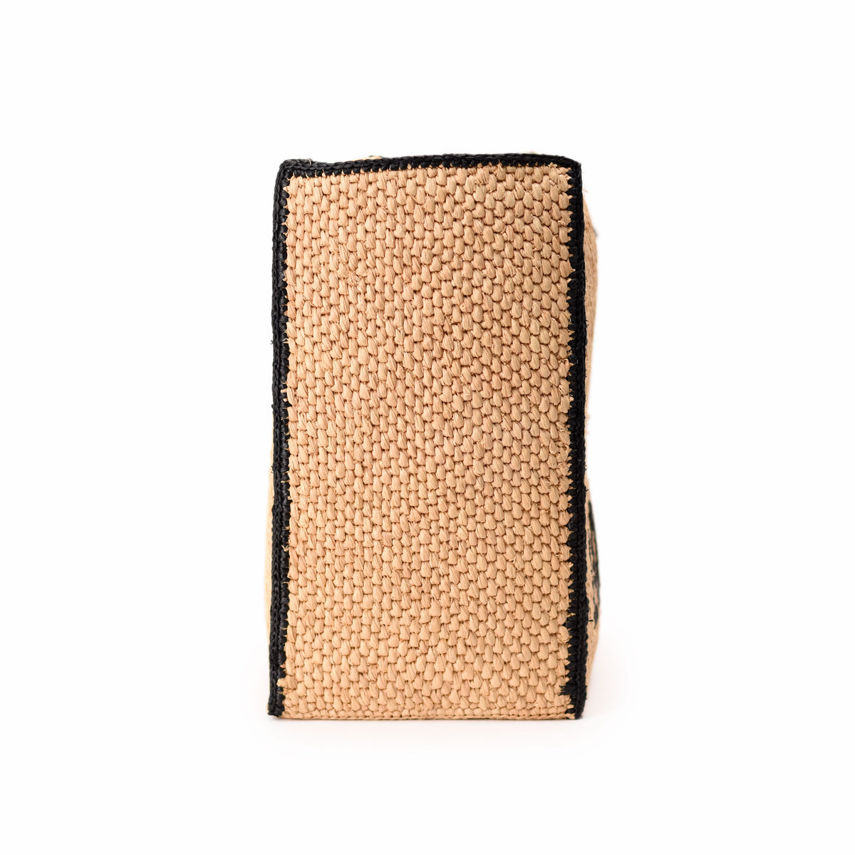 Beige woven straw tote bag with black trim, curated Pre-loved Luxury by Myluxe in Helsinki.