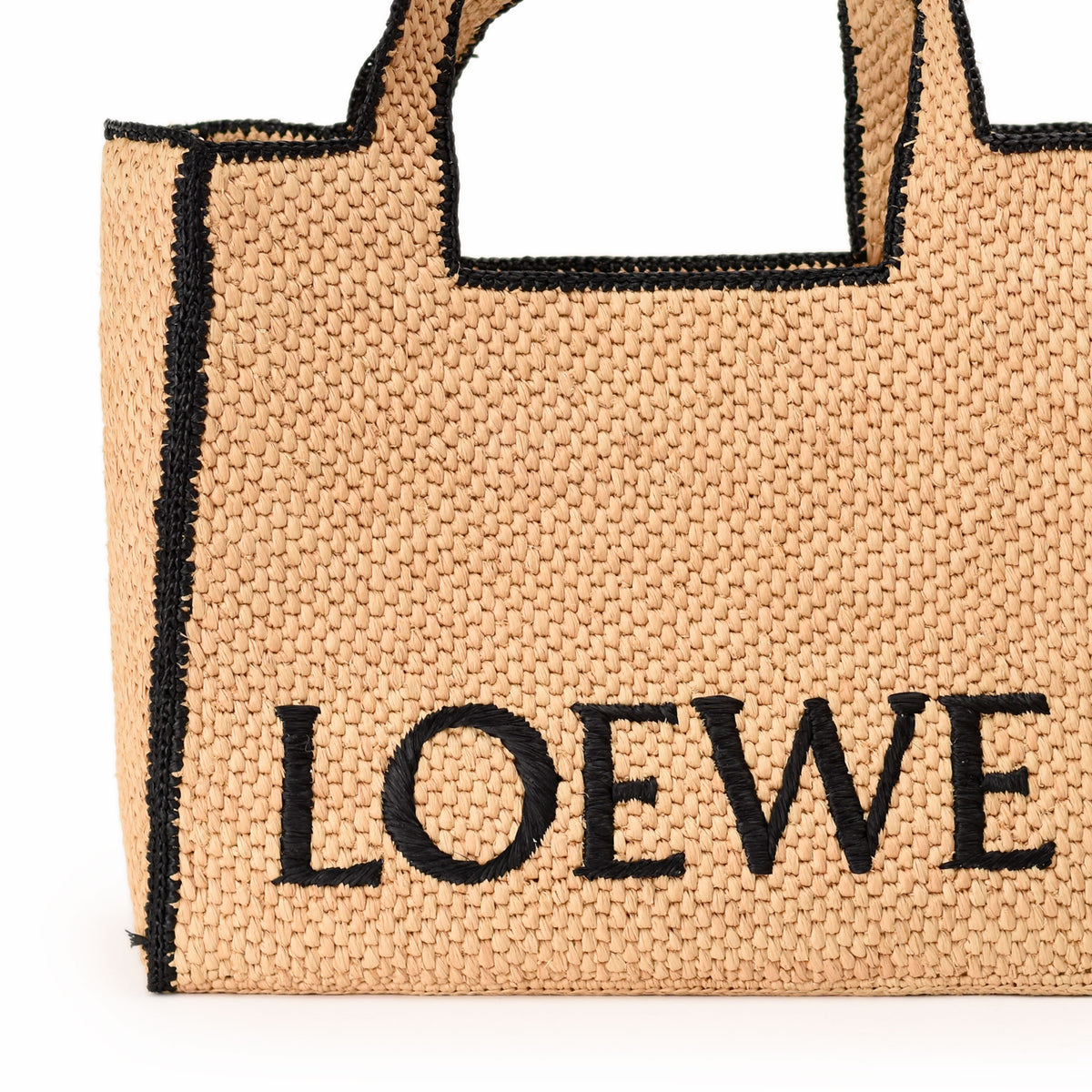 Black embroidered LOEWE straw tote bag. curated Pre-loved Luxury by Myluxe in Helsinki.