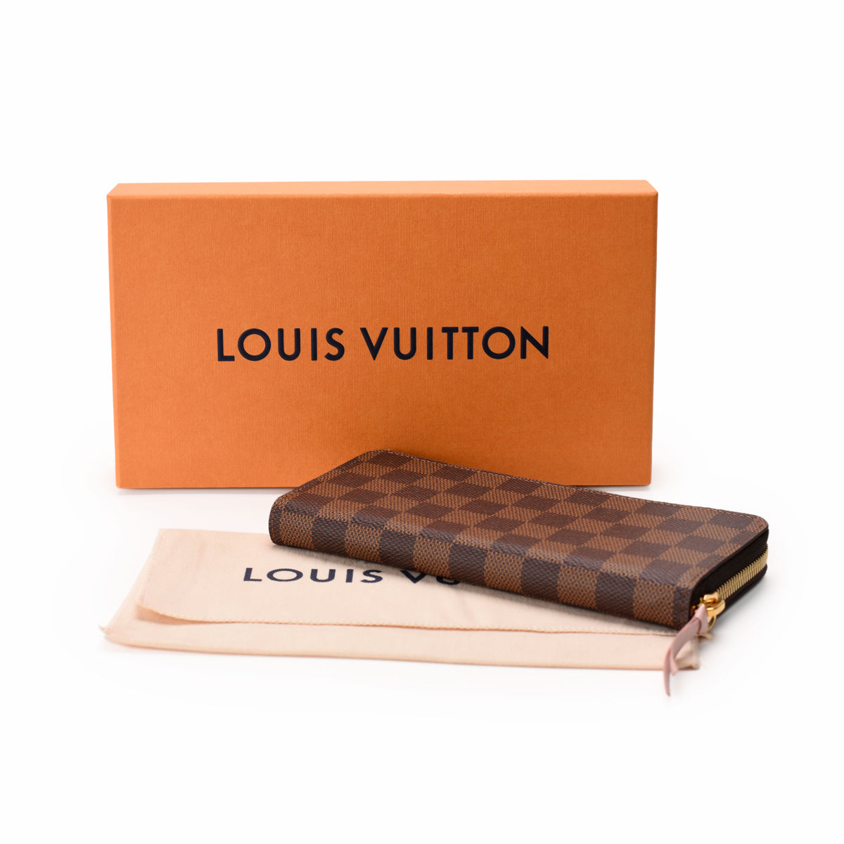 Louis Vuitton Damier Ebene checkered pattern long wallet with orange box, curated Pre-loved Luxury by Myluxe in Helsinki.