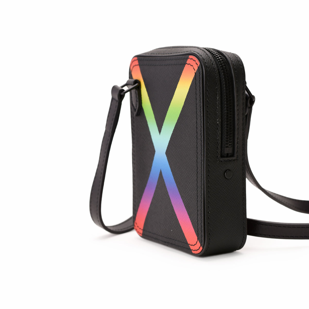 Black leather crossbody bag with a colorful rainbow X design, curated Pre-loved Luxury by Myluxe in Helsinki.