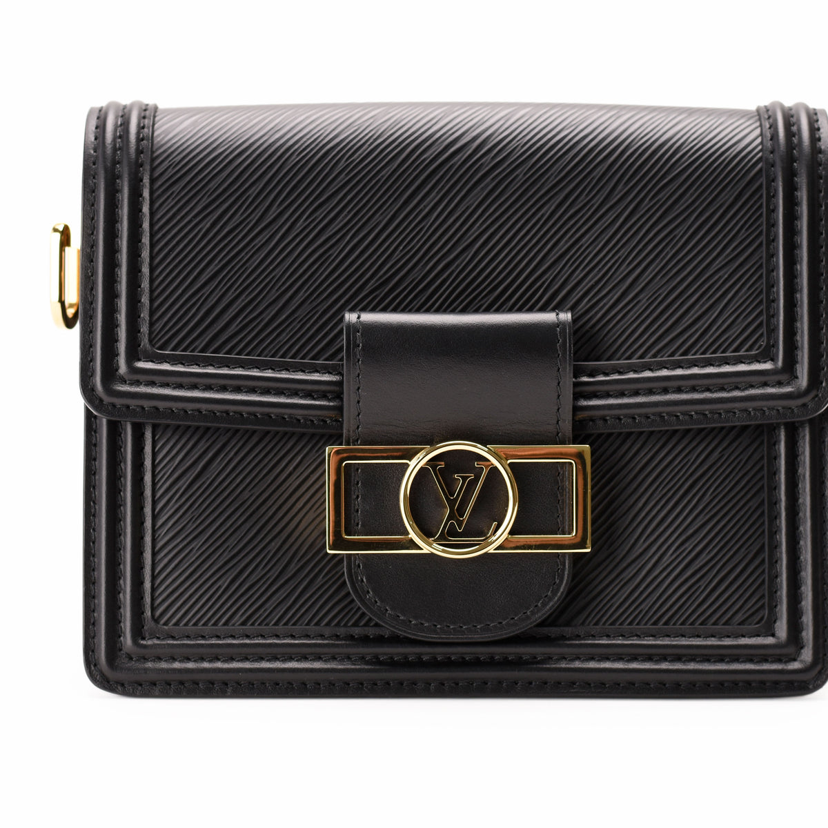 Black textured leather Louis Vuitton crossbody bag with gold-tone hardware, curated Pre-loved Luxury by Myluxe in Helsinki.