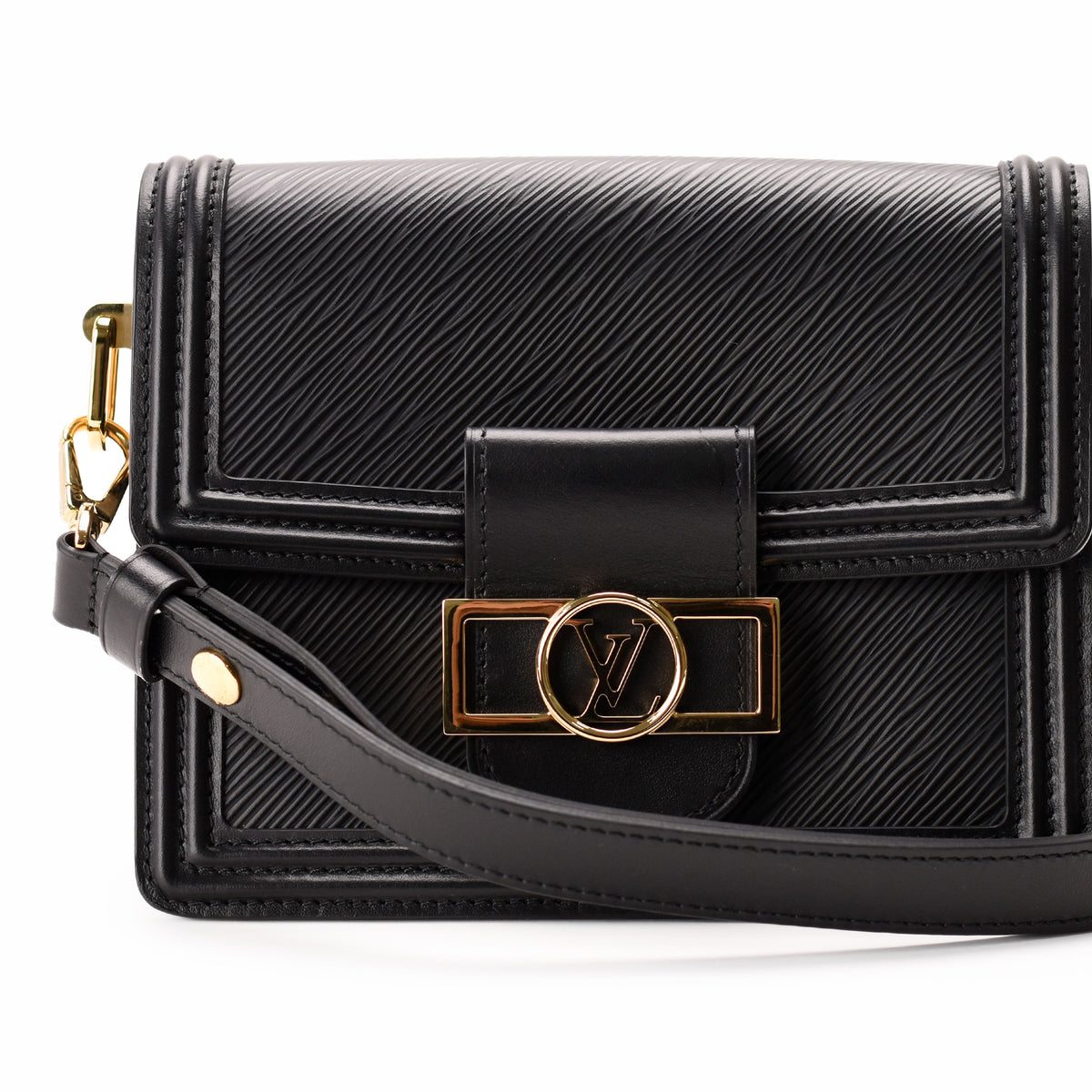 Black textured leather Louis Vuitton crossbody bag with gold-tone hardware, curated Pre-loved Luxury by Myluxe in Helsinki.