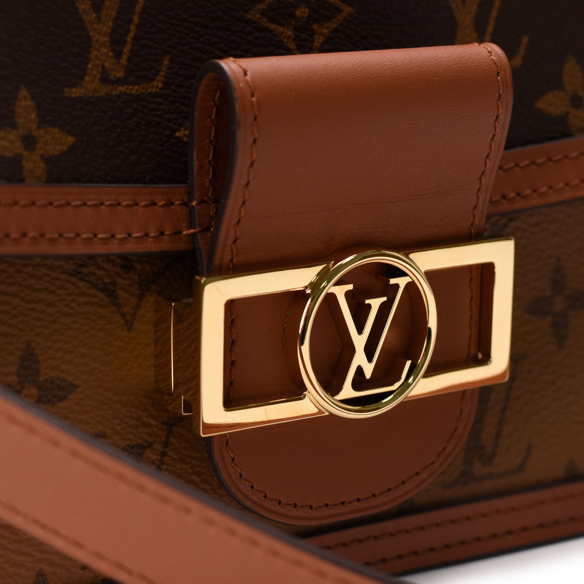 Louis Vuitton brown monogram canvas handbag with gold-tone LV hardware, curated Pre-loved Luxury by Myluxe in Helsinki.