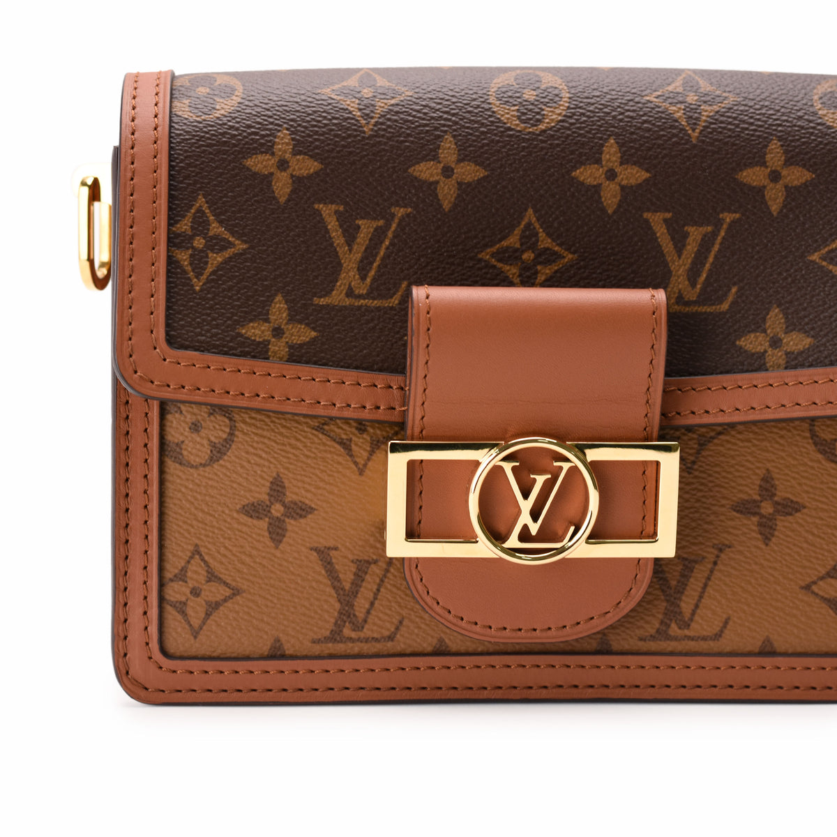 Louis Vuitton monogram canvas leather handbag with gold-tone LV clasp, curated Pre-loved Luxury by Myluxe in Helsinki.