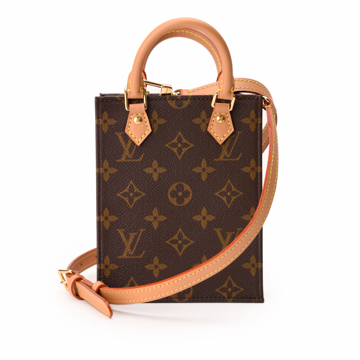 Louis Vuitton monogram brown canvas tote bag with tan leather handles. curated Pre-loved Luxury by Myluxe in Helsinki.