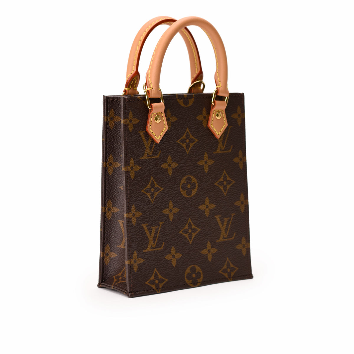 Louis Vuitton monogram brown canvas tote bag with tan leather handles. curated Pre-loved Luxury by Myluxe in Helsinki.