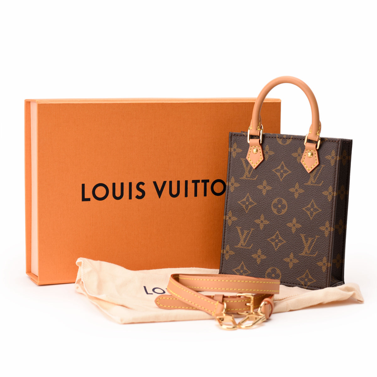 Louis Vuitton Monogram canvas tote bag in brown with tan leather handles. curated Pre-loved Luxury by Myluxe in Helsinki.