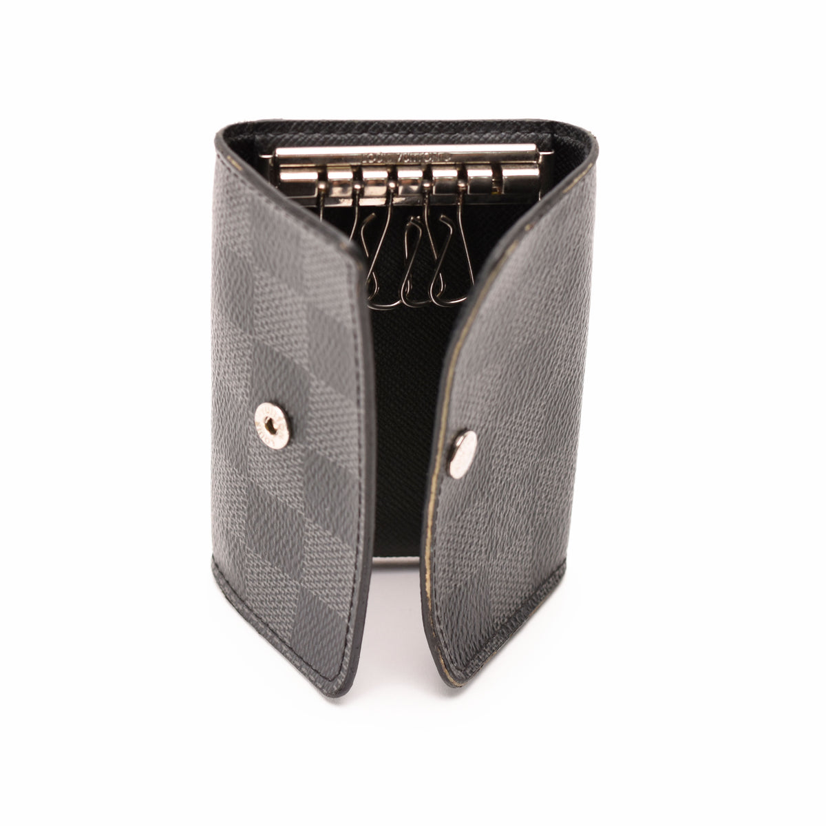 Black Damier pattern leather card holder with silver metal hardware, curated Pre-loved Luxury by Myluxe in Helsinki.