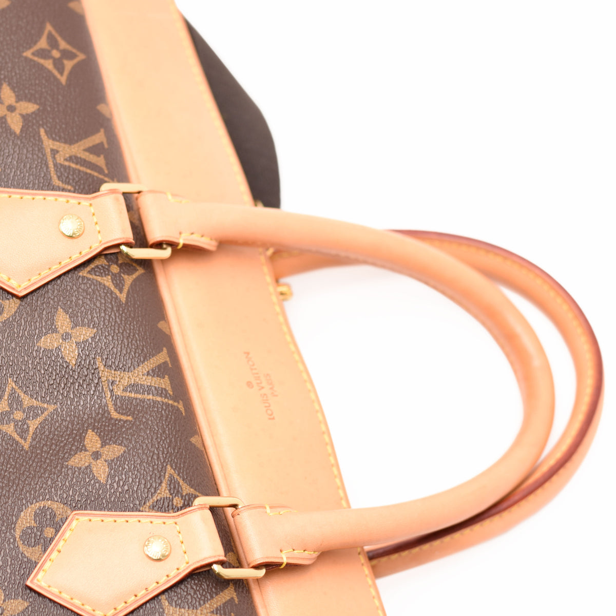 Louis Vuitton monogram brown canvas handbag with tan leather handles, curated Pre-loved Luxury by Myluxe in Helsinki.