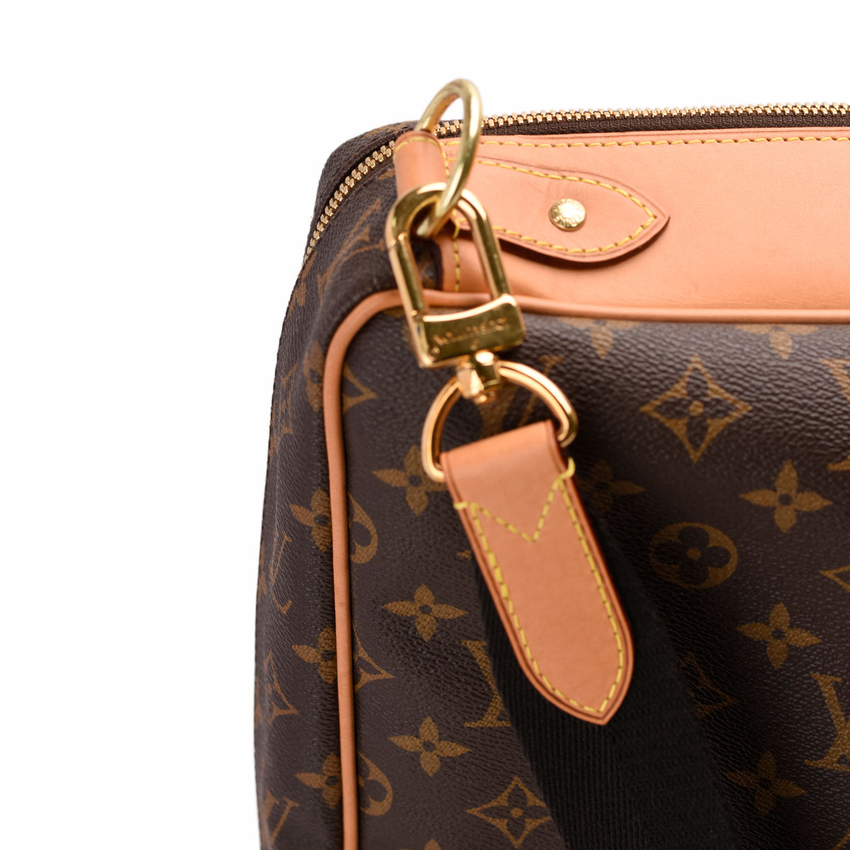 Louis Vuitton monogram canvas handbag with tan leather trim and gold-tone hardware, curated Pre-loved Luxury by Myluxe in Helsinki.