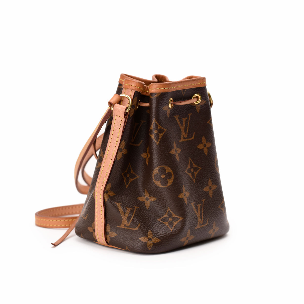 Louis Vuitton monogram canvas bucket bag in brown with tan leather trim, curated Pre-loved Luxury by Myluxe in Helsinki.