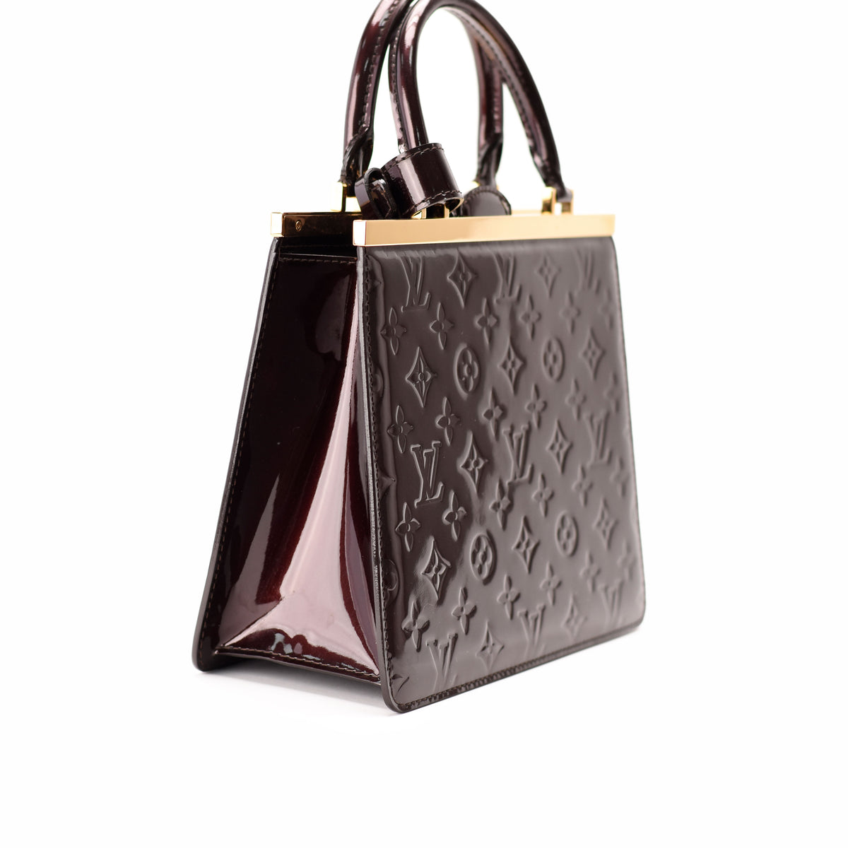 Dark burgundy patent leather monogram handbag with gold-tone hardware, curated Pre-loved Luxury by Myluxe in Helsinki.