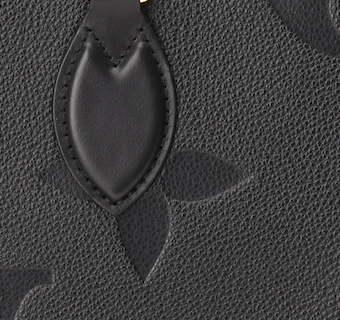 Close-up of black leather Louis Vuitton Onthego MM detailing, curated Pre-loved Luxury by Myluxe in Helsinki.