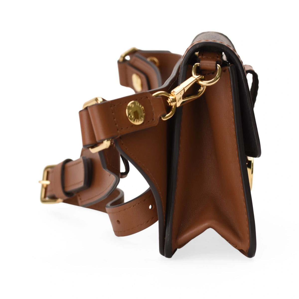 Louis Vuitton Dauphine Monogram Reverse belt bag in brown leather with gold-tone hardware. curated Pre-loved Luxury by Myluxe in Helsinki.
