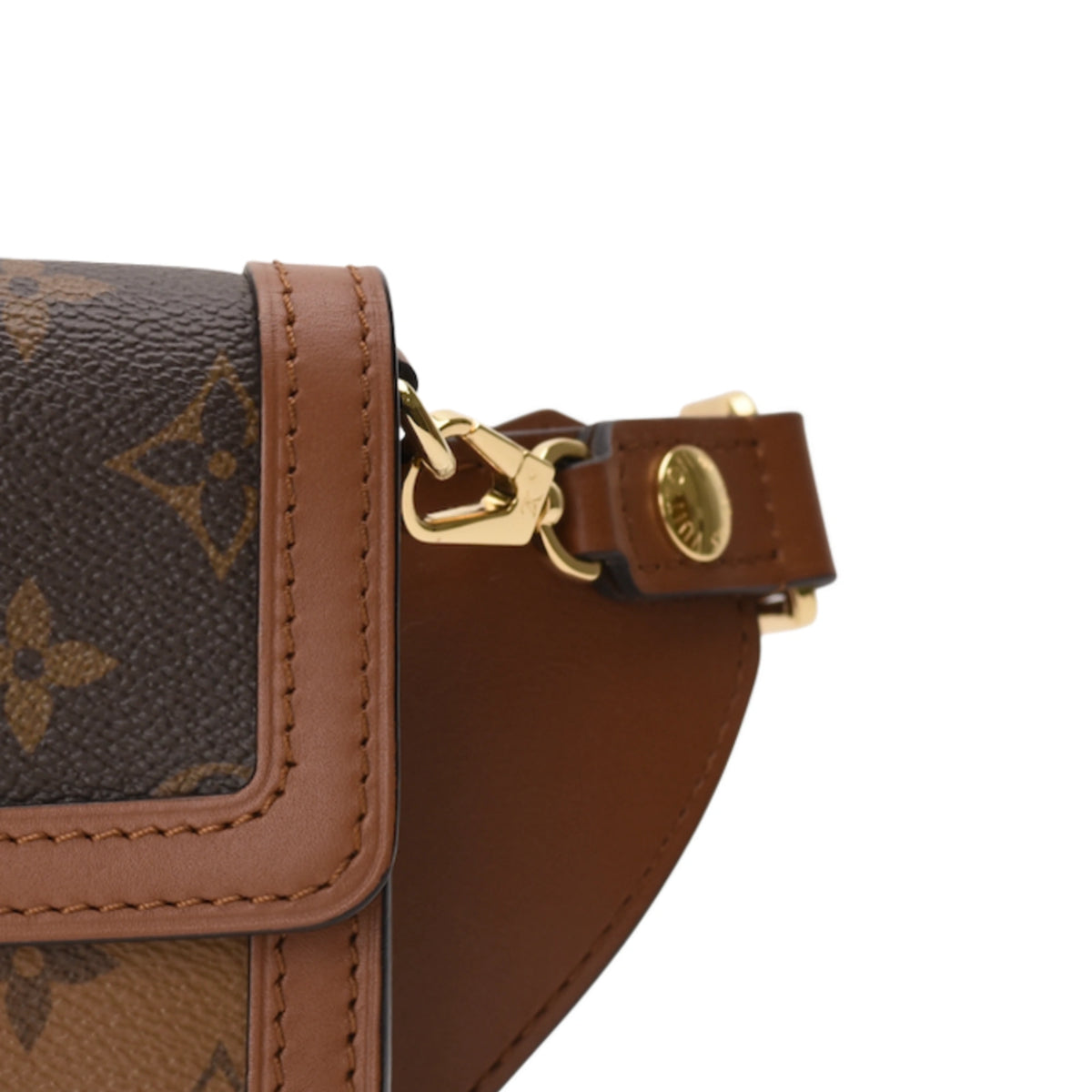 Louis Vuitton Monogram Reverse Belt Bag with gold-tone hardware. curated Pre-loved Luxury by Myluxe in Helsinki.