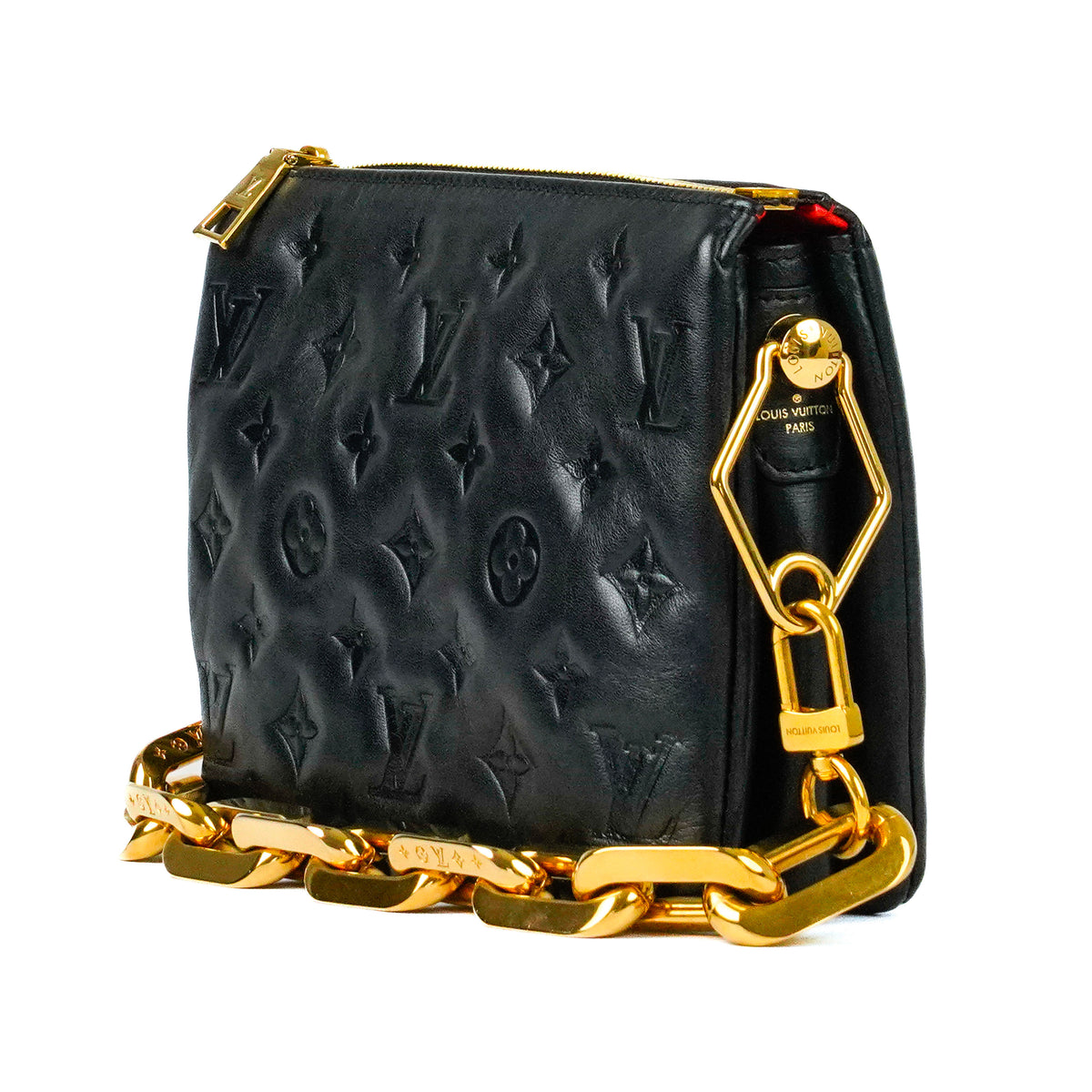Black embossed leather Louis Vuitton handbag with chunky gold-tone chain strap, curated Pre-loved Luxury by Myluxe in Helsinki.