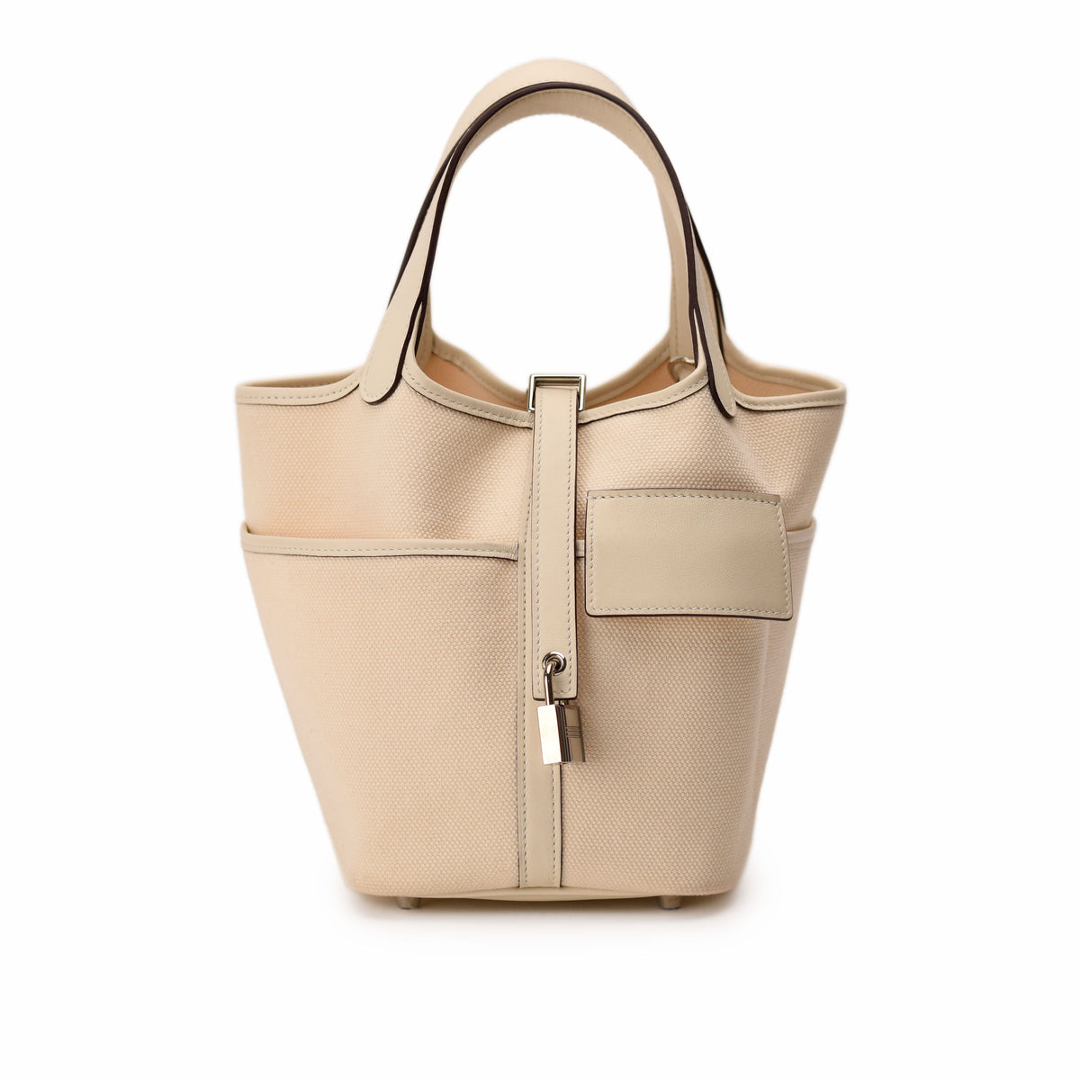 Cream canvas tote bag with leather trim and silver hardware. curated Pre-loved Luxury by Myluxe in Helsinki.