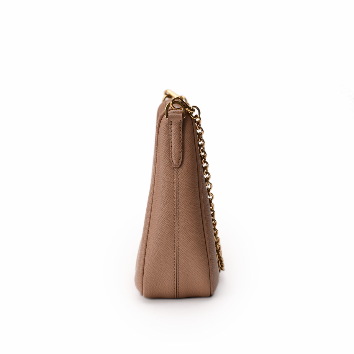 Side view of a beige textured leather handbag with a gold chain strap, curated Pre-loved Luxury by Myluxe in Helsinki.