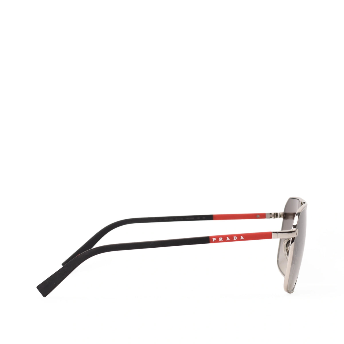 Side view of silver Prada Linea Rossa sunglasses with black arms and red stripe. curated Pre-loved Luxury by Myluxe in Helsinki.