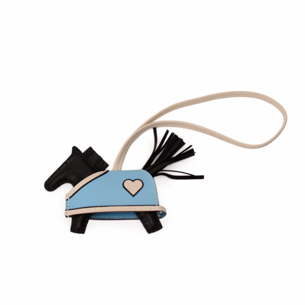 Blue and black leather horse charm with a heart detail. curated Pre-loved Luxury by Myluxe in Helsinki.
