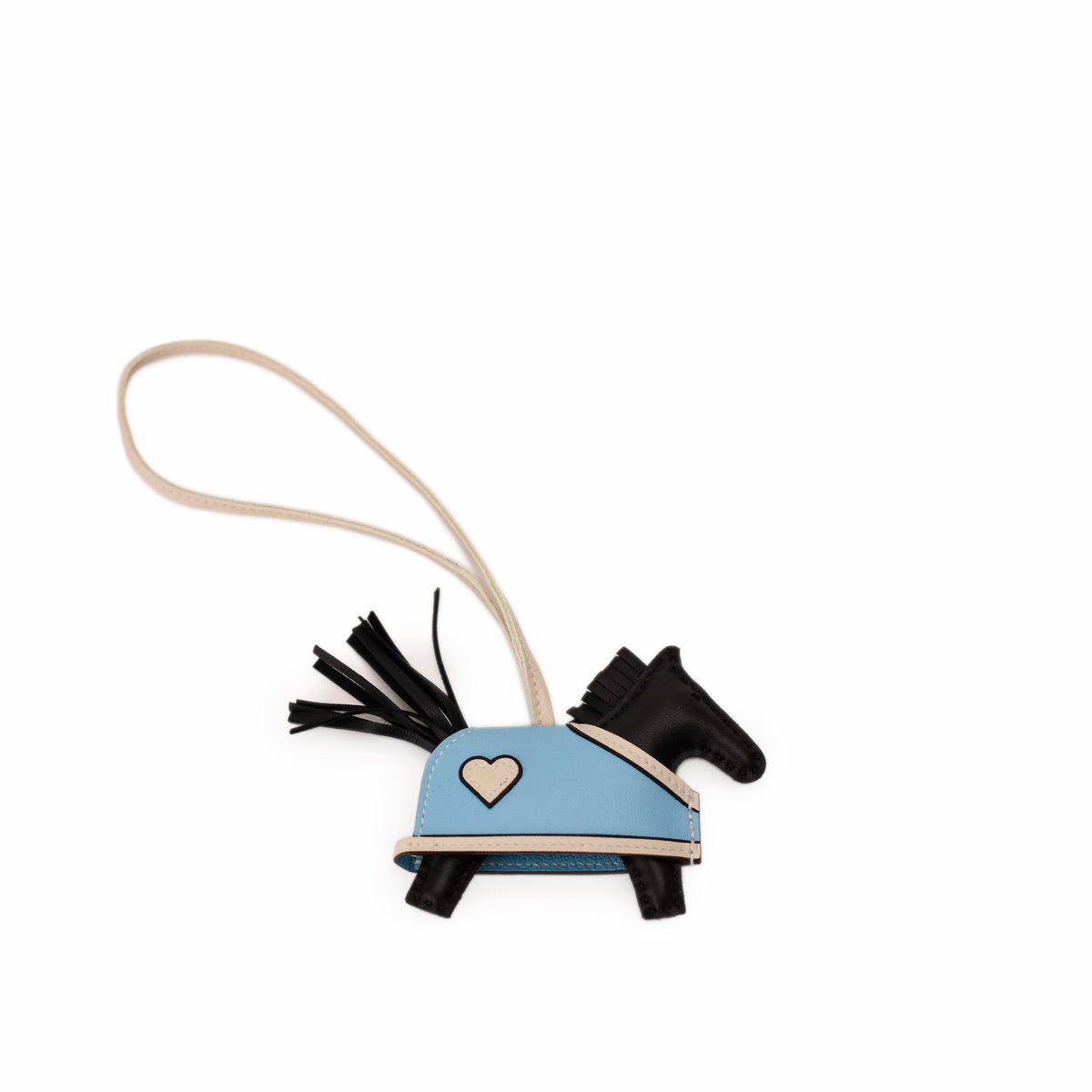 Blue and black leather horse charm accessory with heart detail. curated Pre-loved Luxury by Myluxe in Helsinki.