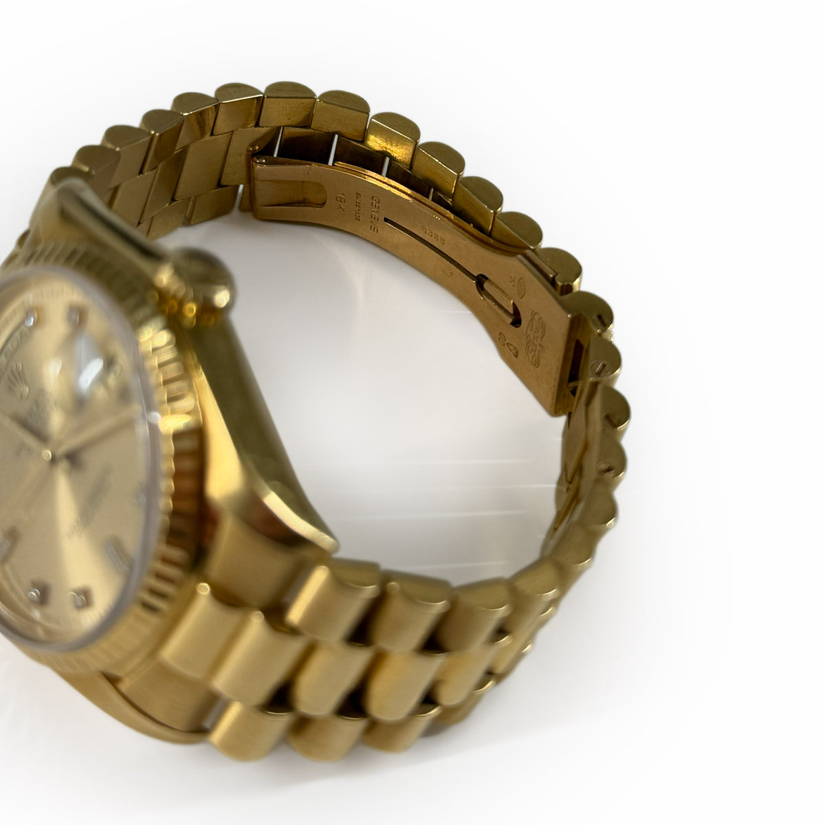 Gold-tone luxury wristwatch with a polished metal link bracelet, curated Pre-loved Luxury by Myluxe in Helsinki.
