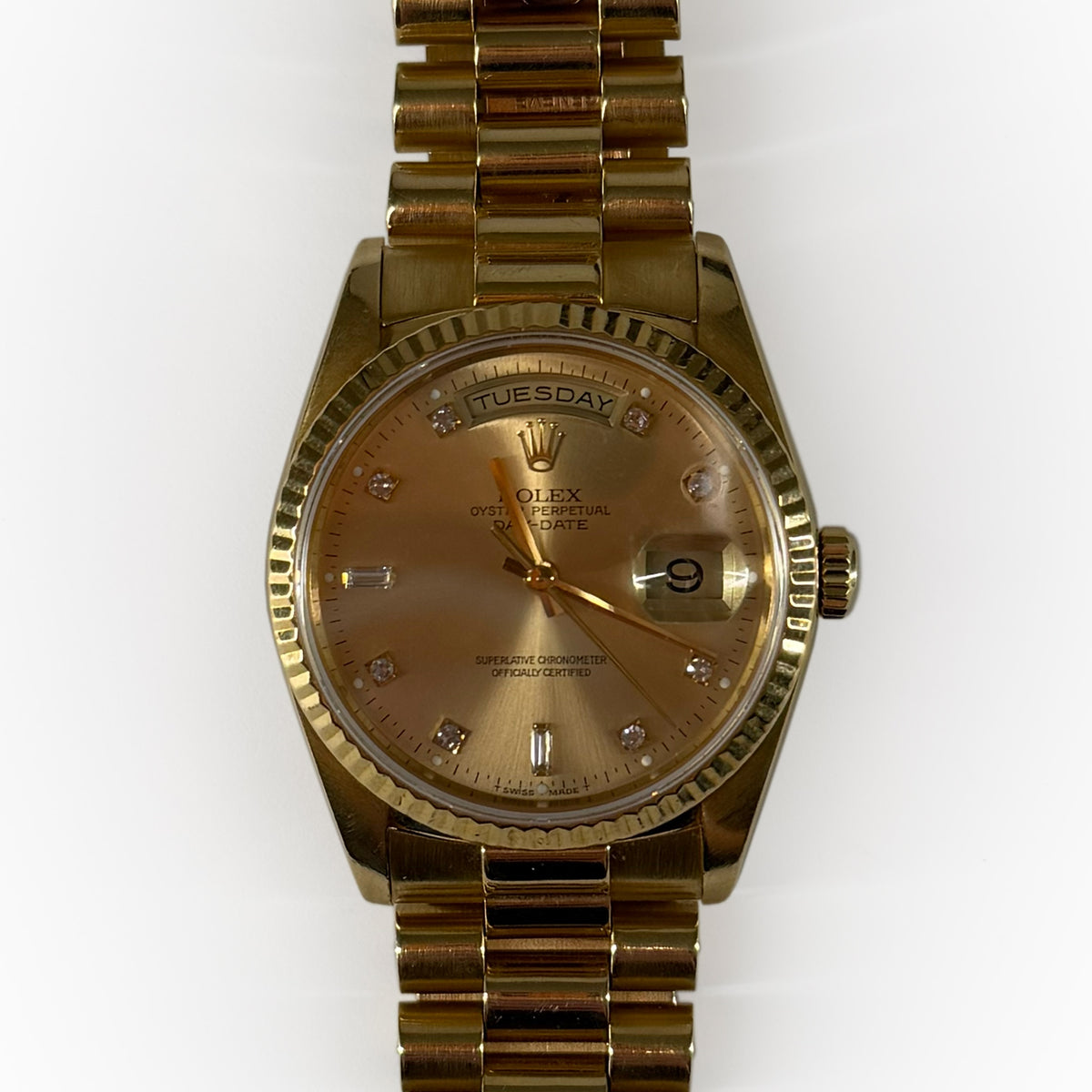 Gold Rolex Oyster Perpetual Day-Date watch with diamond dial, curated Pre-loved Luxury by Myluxe in Helsinki.