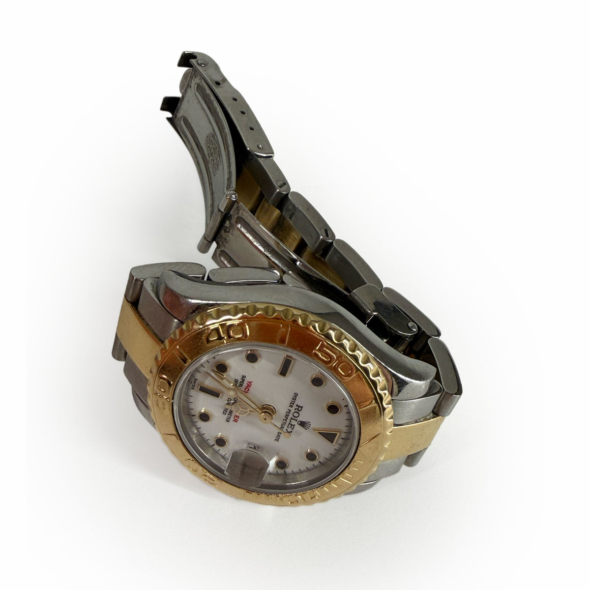 Rolex Yacht-Master watch with gold bezel and silver steel bracelet, curated Pre-loved Luxury by Myluxe in Helsinki.