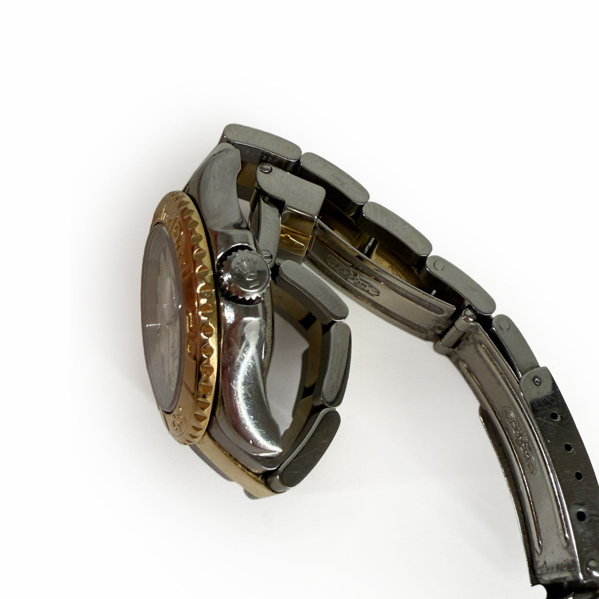 Silver and gold tone stainless steel luxury wristwatch, curated Pre-loved Luxury by Myluxe in Helsinki.