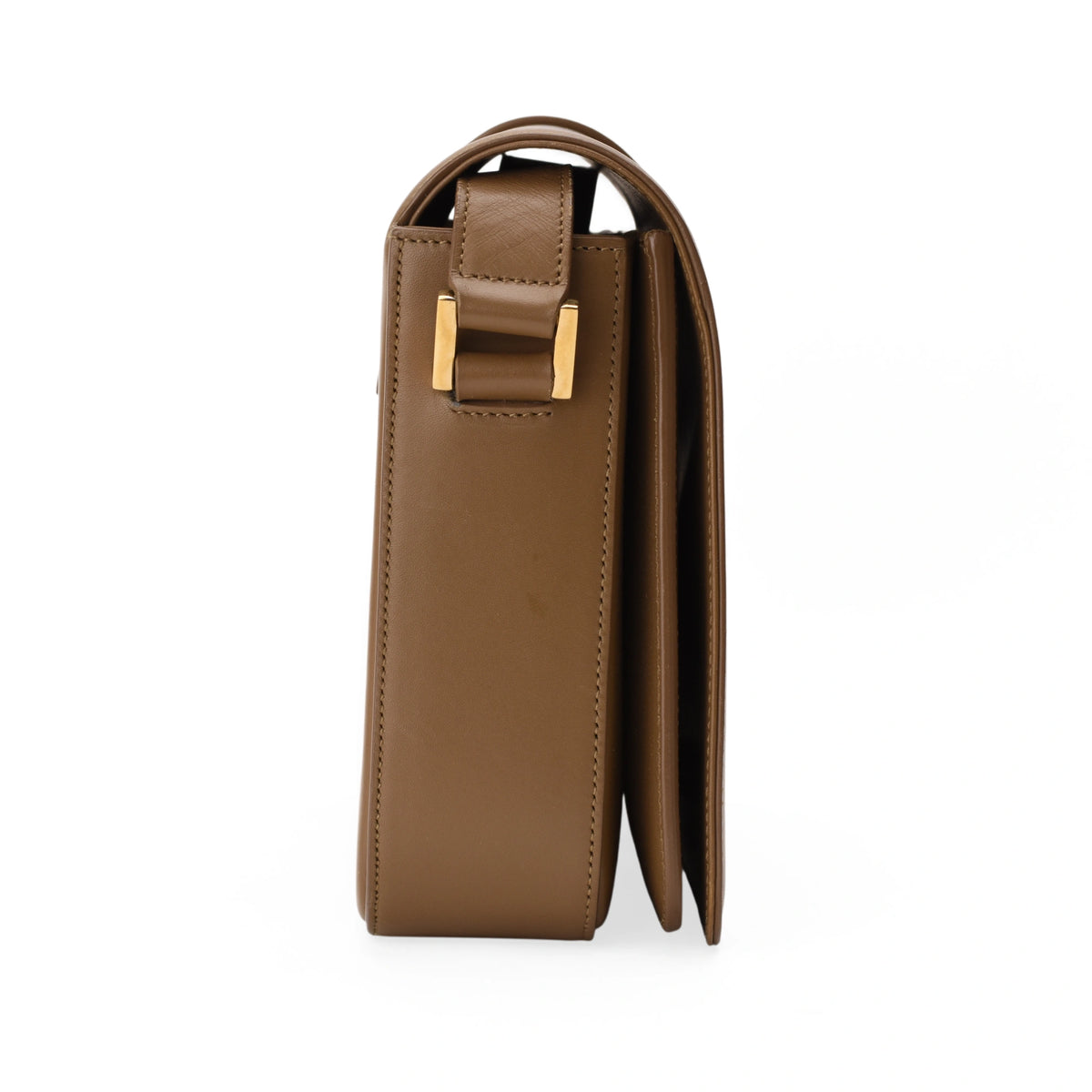 Brown leather designer shoulder bag with gold-tone buckle, curated Pre-loved Luxury by Myluxe in Helsinki.