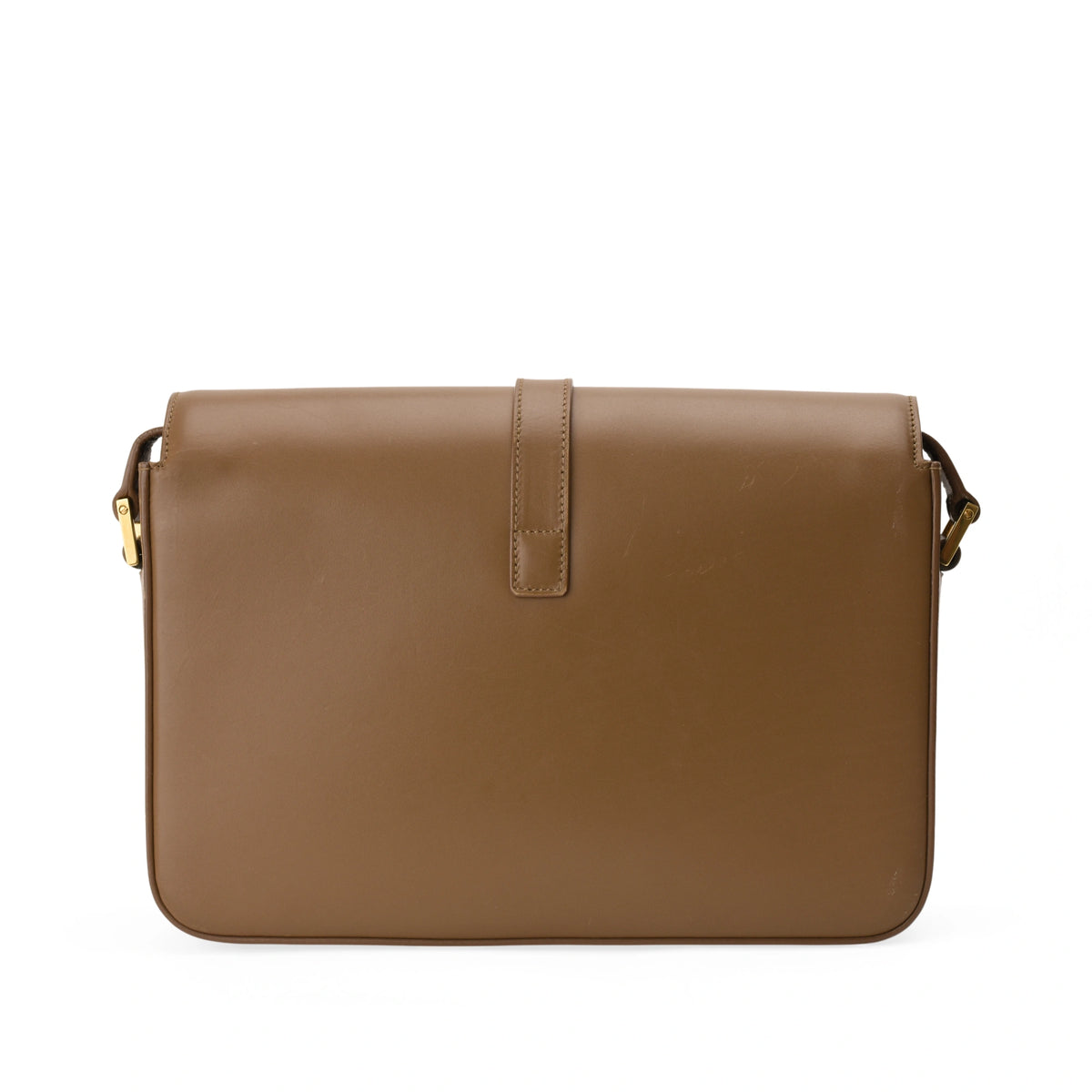Brown leather shoulder bag with a fold-over flap, curated Pre-loved Luxury by Myluxe in Helsinki.