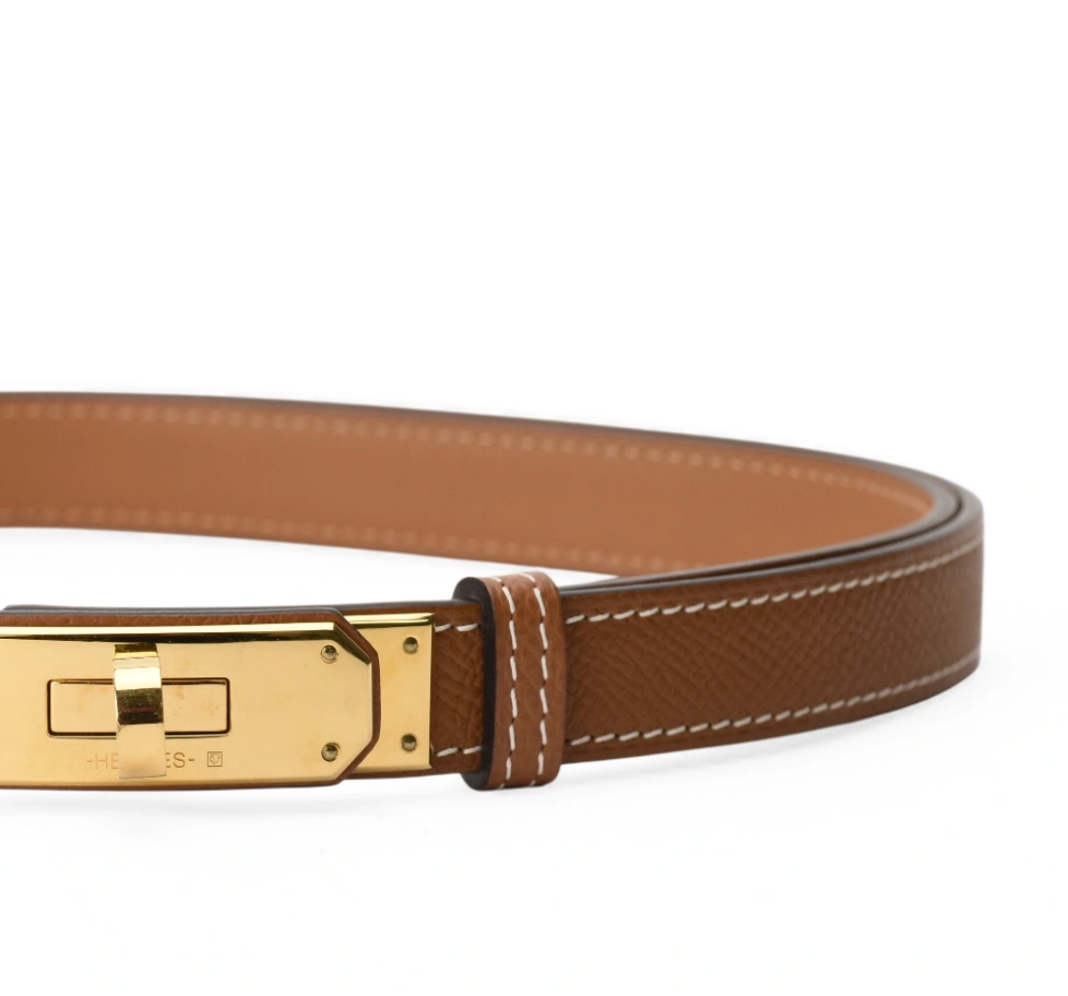 Brown leather Hermès belt with gold hardware, curated Pre-loved Luxury by Myluxe in Helsinki.