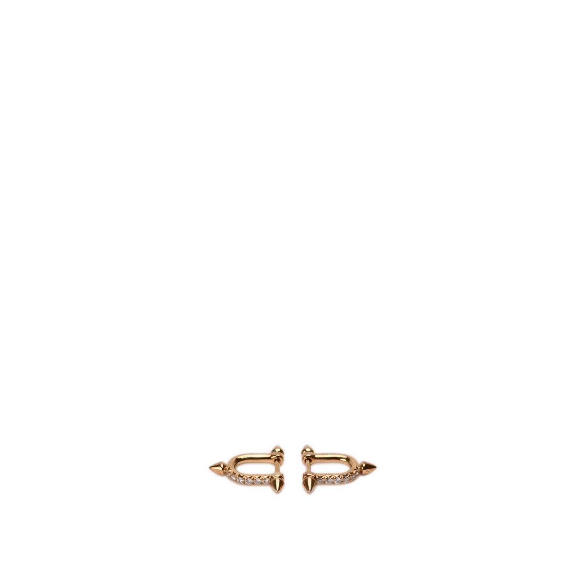 Gold-toned arrow hoop earrings with sparkling pavé stones, curated Pre-loved Luxury by Myluxe in Helsinki.