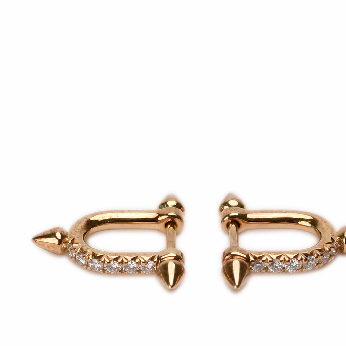 Rose gold diamond-encrusted hoop earrings with pointed conical accents, curated Pre-loved Luxury by Myluxe in Helsinki.