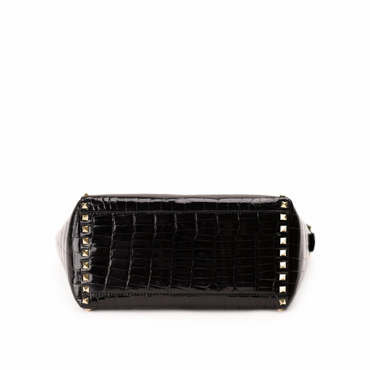 Black crocodile embossed leather handbag with gold stud detailing. curated Pre-loved Luxury by Myluxe in Helsinki.