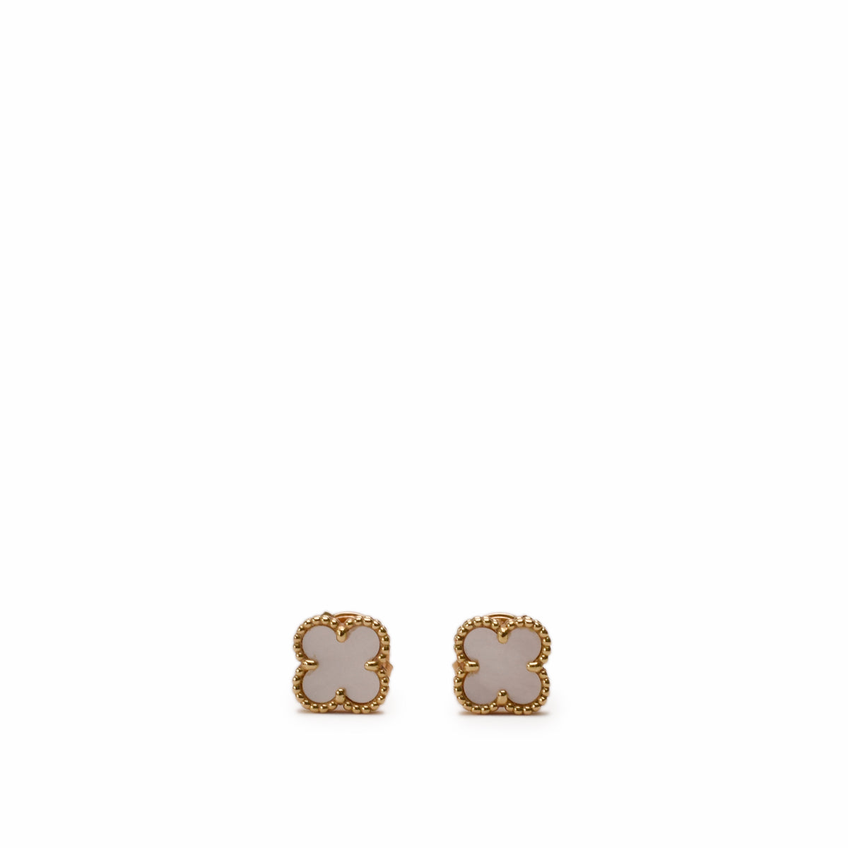 Gold clover-shaped stud earrings with white mother of pearl, curated Pre-loved Luxury by Myluxe in Helsinki.