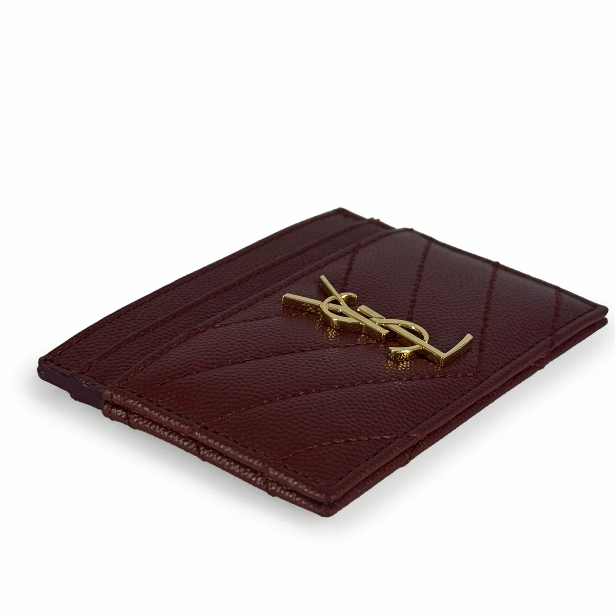Burgundy leather Saint Laurent card holder with gold YSL logo, curated Pre-loved Luxury by Myluxe in Helsinki.