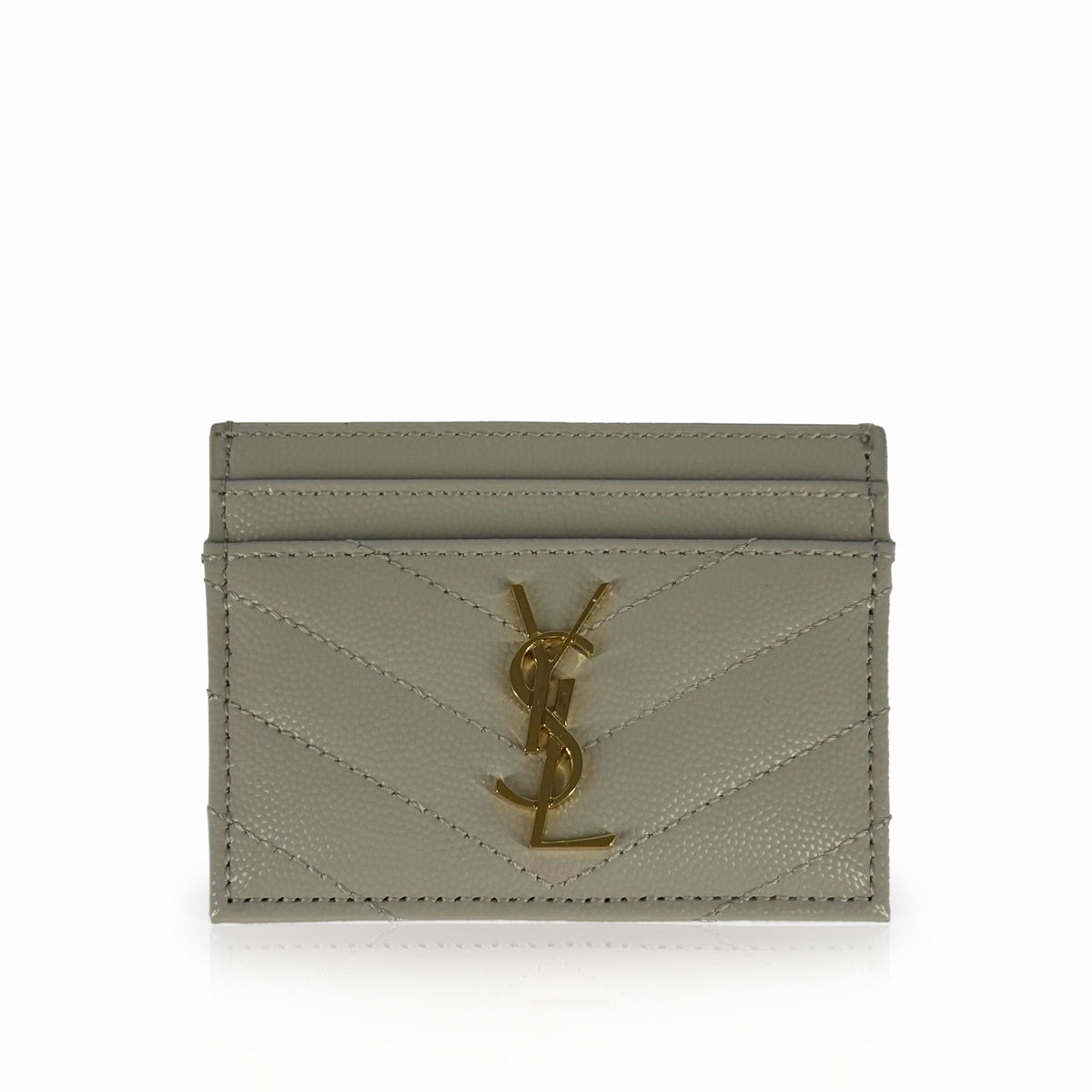 Saint Laurent beige quilted leather card holder with gold YSL logo, curated Pre-loved Luxury by Myluxe in Helsinki.