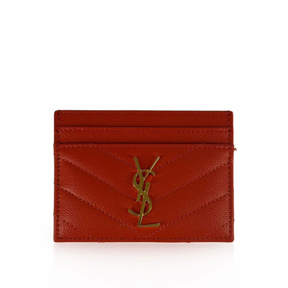 Red grained leather YSL card holder with gold-tone logo, curated Pre-loved Luxury by Myluxe in Helsinki.