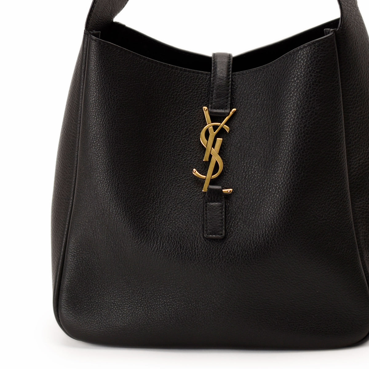 Black grained leather Saint Laurent handbag with gold YSL logo, curated Pre-loved Luxury by Myluxe in Helsinki.